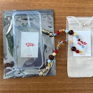 Ossa New York 16 Pro Max Case with Orbit Wristlet